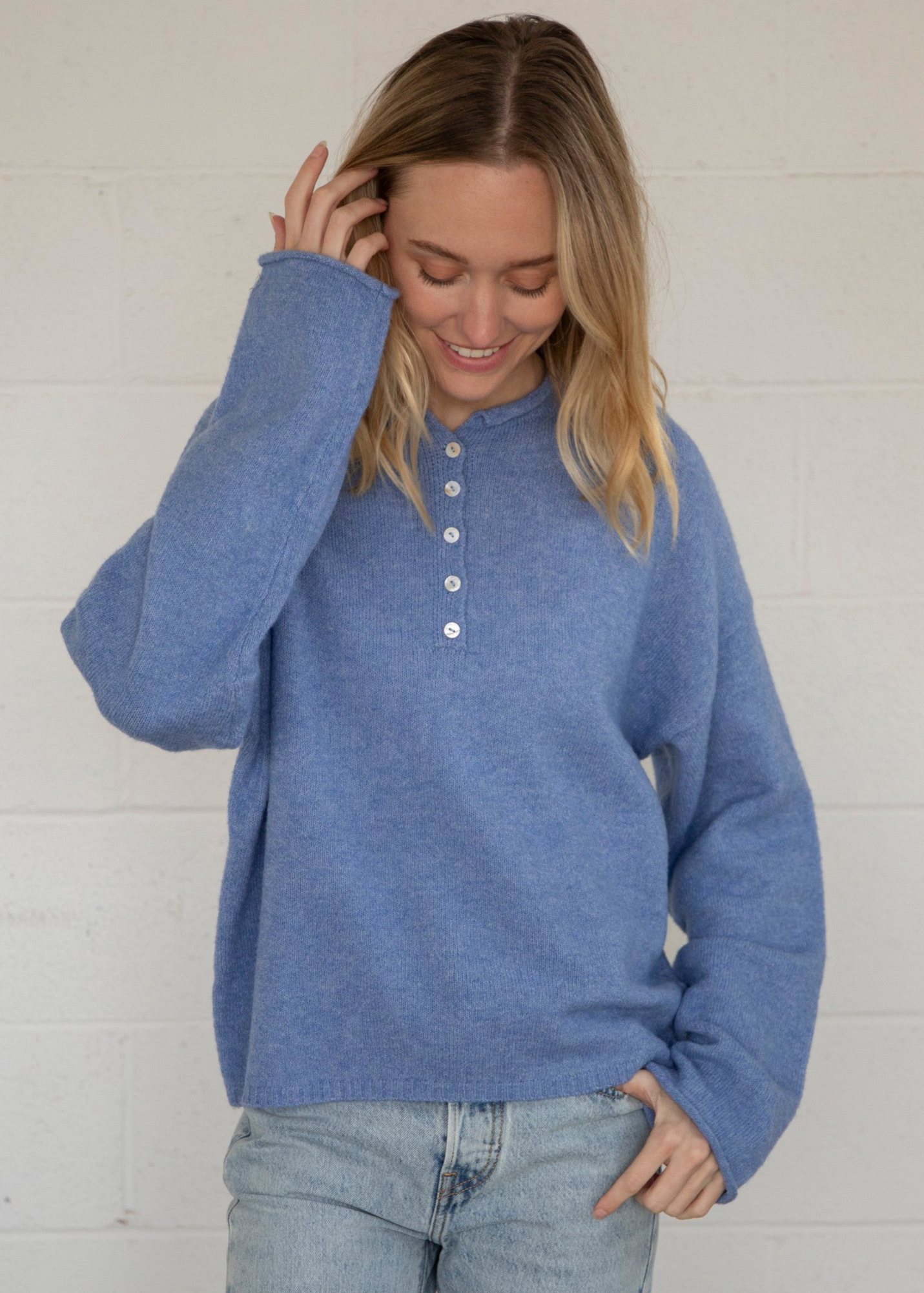 Blue sweater with buttons