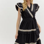 Black dress with cream ricrac, midi length