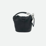 Black handbag with a decorative ribbon