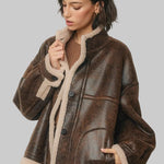 Brown faux leather sherpa jacket with cream collar, cuffs and hem