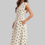 Cream dress with brown polka dots