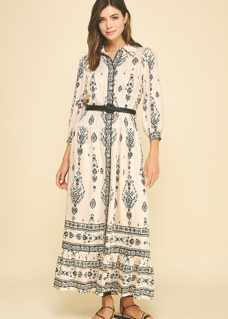 Button front cream colored maxi dress with black floral pattern