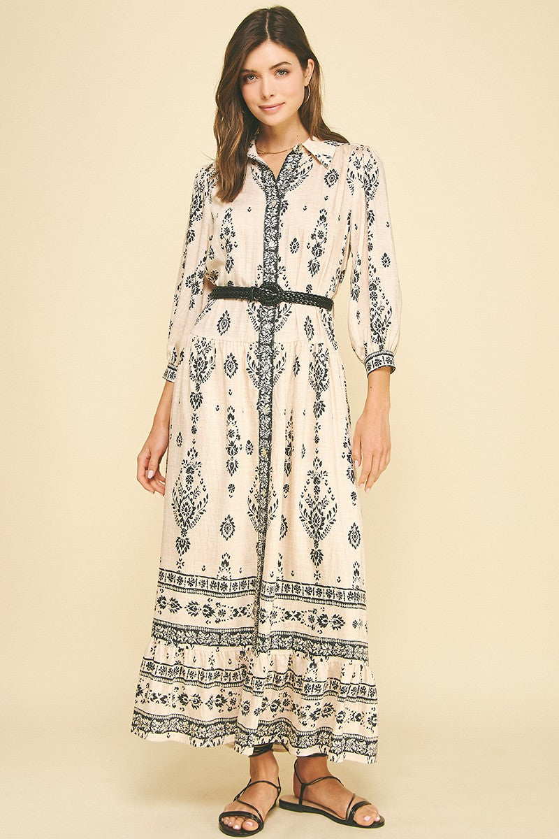 Button front cream colored maxi dress with black floral pattern