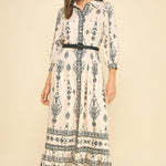 Button front cream colored maxi dress with black floral pattern