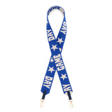 A blue purse strap with white text reading 'DAY GAME DAY' and white star patterns, featuring gold-tone metal clasps at the bottom.