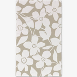 A hand towel with a floral pattern in tan and white colors.