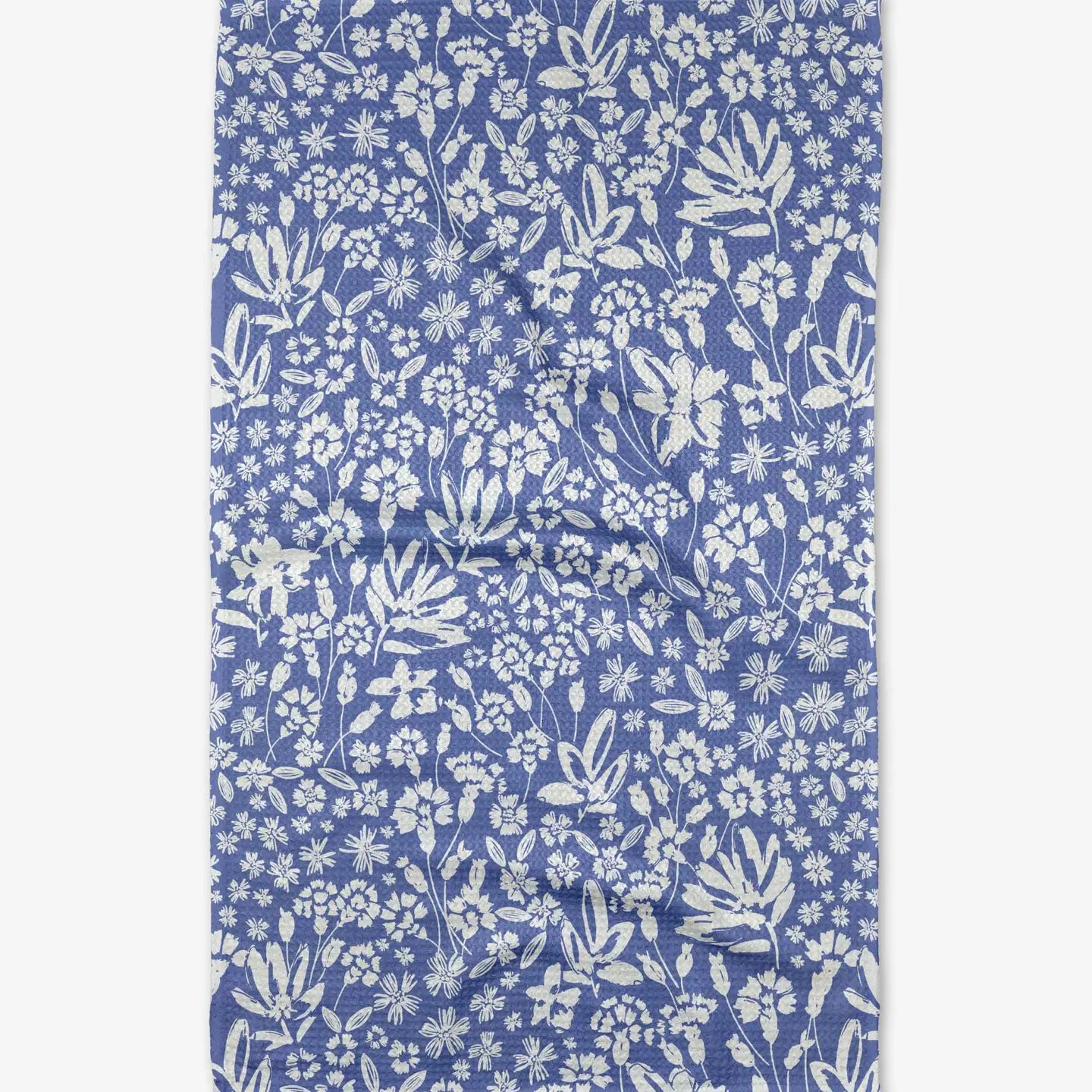 A blue floral patterned tea towel