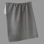 A black and white gingham checkered towel