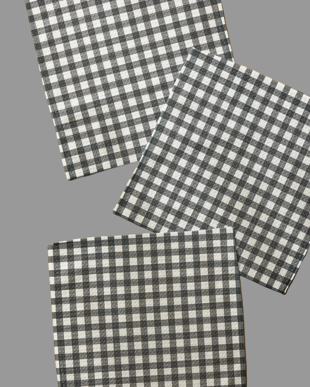 Three square black and white gingham check dishcloths