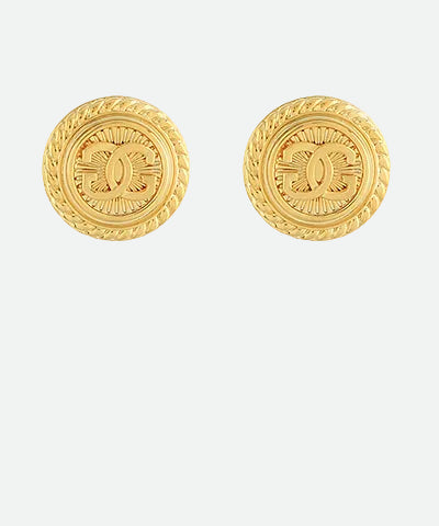 Pair of gold earrings with intricate design 