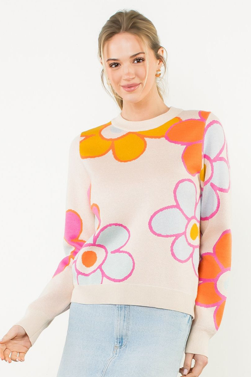 Long sleeve cream sweater with bright flowers