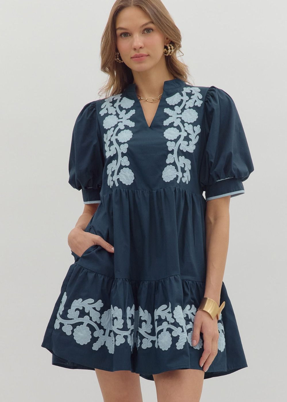 Short sleeved, baby doll navy dress with lt. blue floral appliques