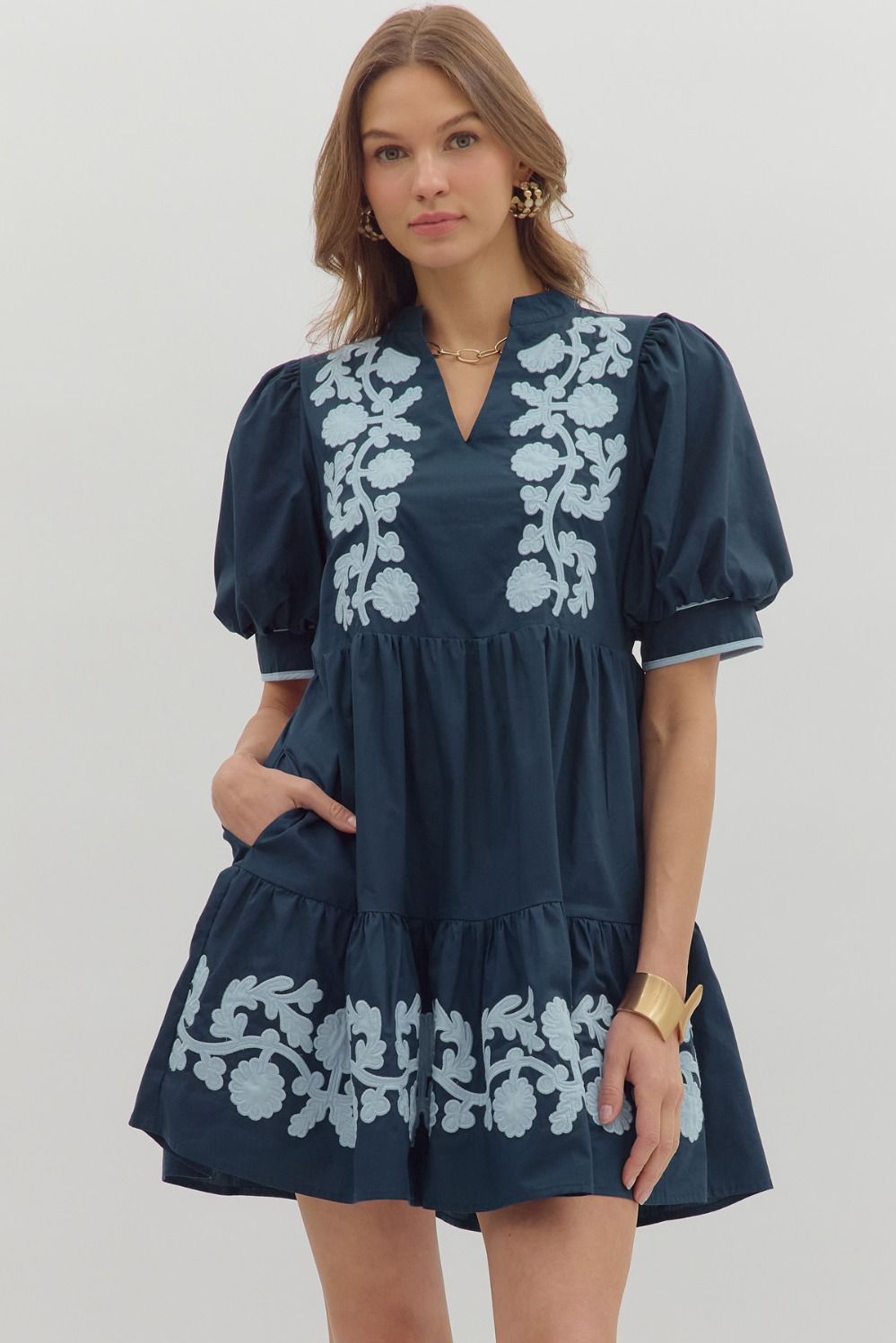 Short sleeved, baby doll navy dress with lt. blue floral appliques