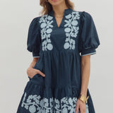 Short sleeved, baby doll navy dress with lt. blue floral appliques