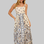 Woman wearing a long, patterned dress
