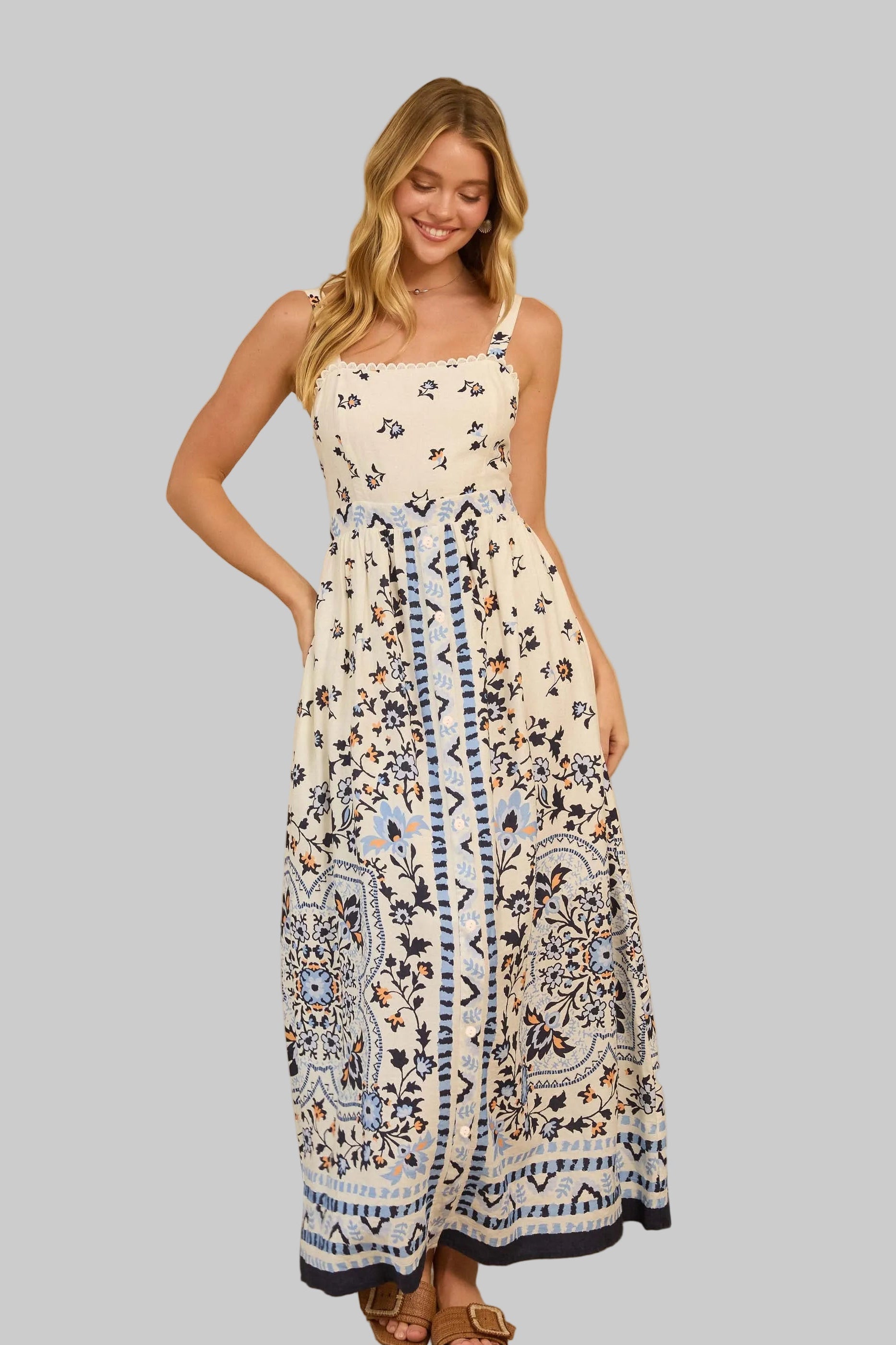 Woman wearing a long, patterned dress