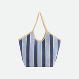Striped tote bag with blue and beige pattern