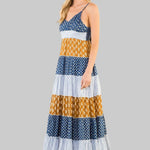 patterned dress with blue, yellow, and white colors