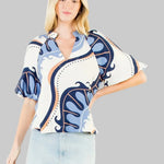 THML brand navy, taupe, and light blue abstract patterned blouse