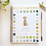 Watercolor workbook titled 'Animals' with a dog illustration
