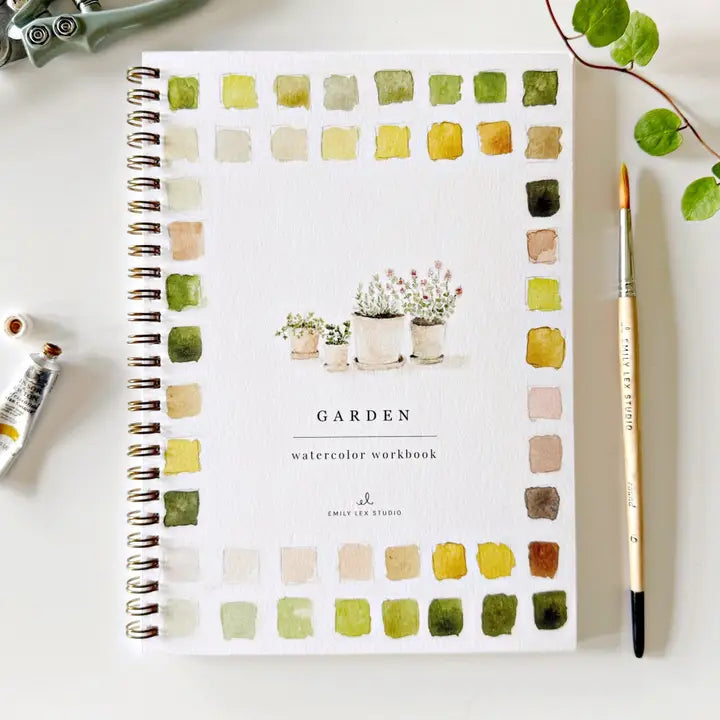 Watercolor workbook titled 'Garden' with color swatches