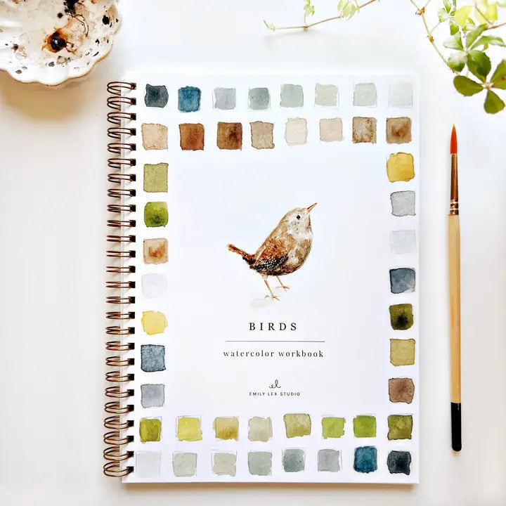 Watercolor workbook with bird illustration
