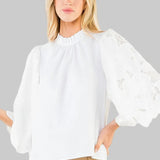 white blouse with eyelet Sleeves