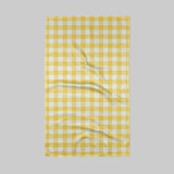 Yellow and white checkered towel