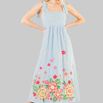 light blue stripe dress with floral embroidery on the hem