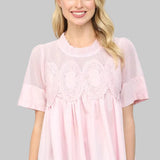 light pink blouse with lace details 