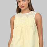 light yellow sleeveless top