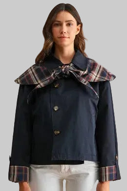 Navy women's jacket with plaid tie collar and plaid cuff details